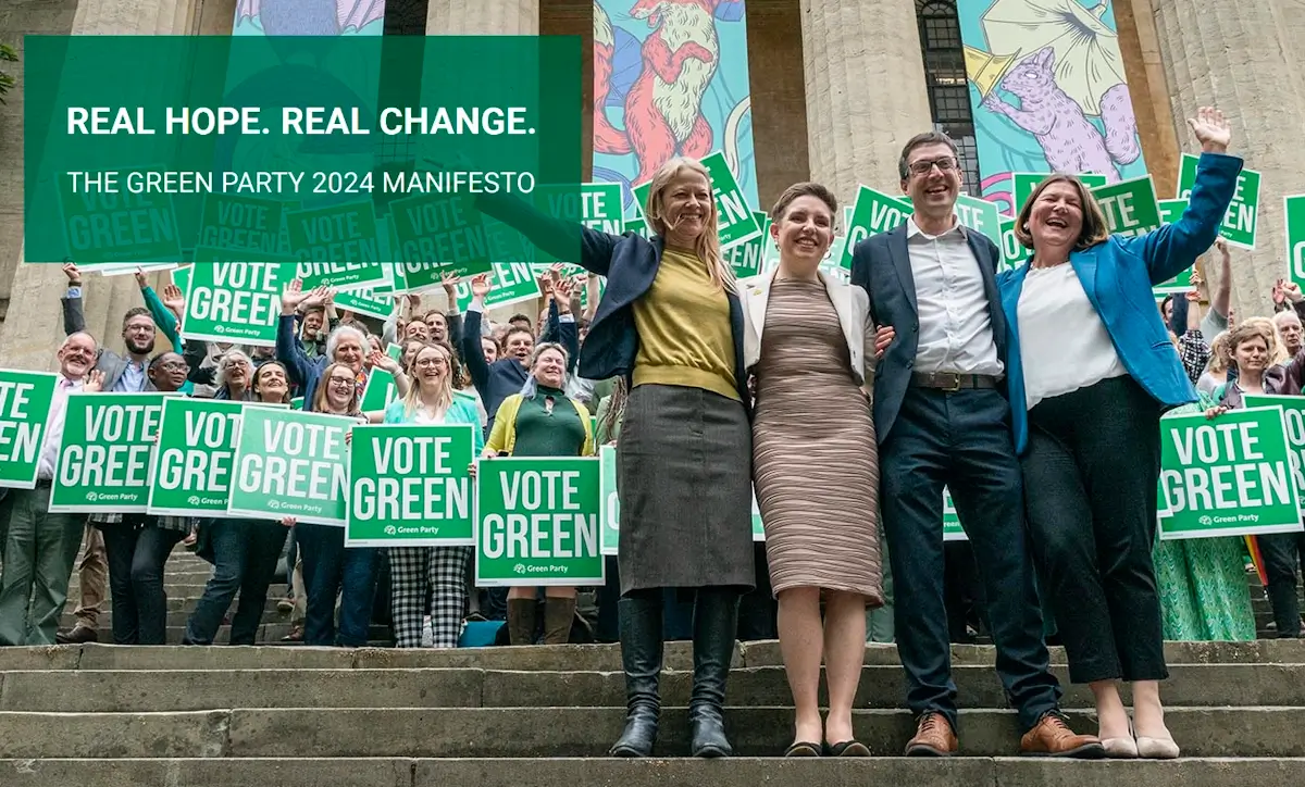 green party leaders standing on the steps of a large building waving with superimposed wording real hope real change - the green  party 2024 manifesto